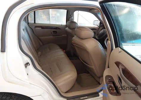 1999 Lincoln Town Car Executive из США, поврежденный, VIN 1LNHM81WXXY718705